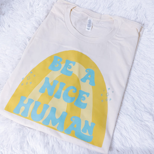 Over The Shop Be A Nice Human Tee